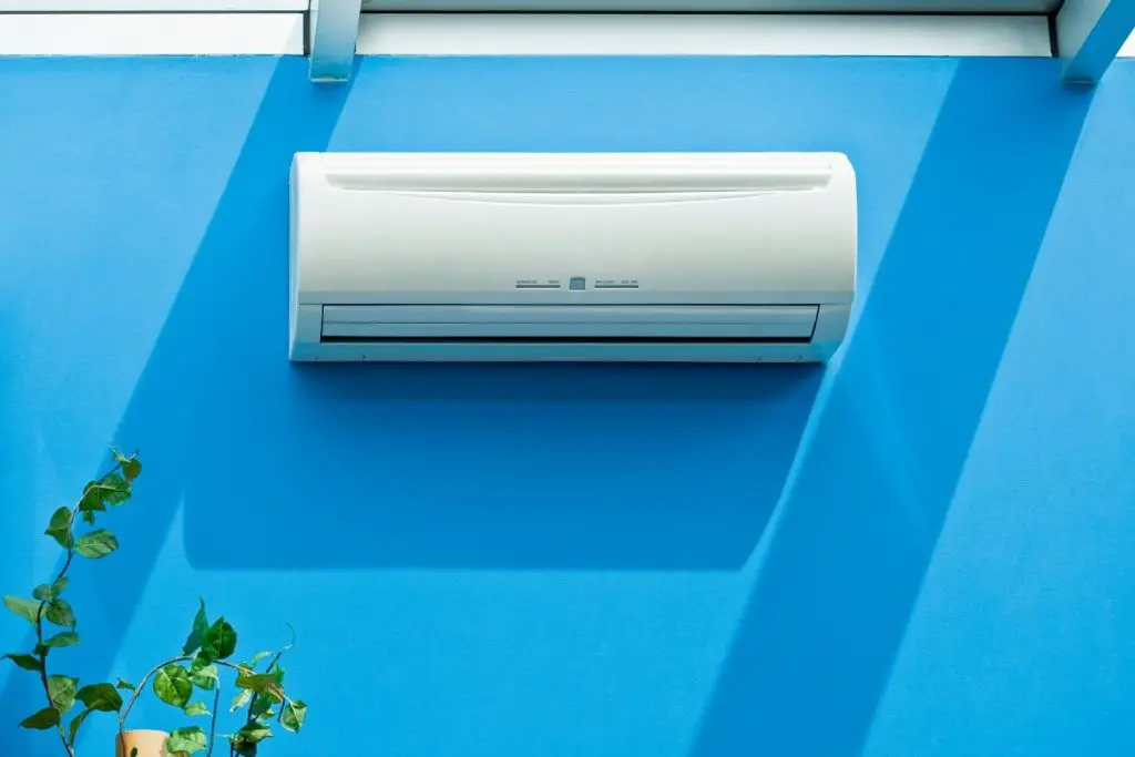 Using an air conditioner to ventilate a room